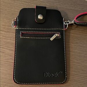 Dteck black leather crossbody phone pouch with red trim. NWOT